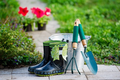Gardener assessing a garden with clipboard
